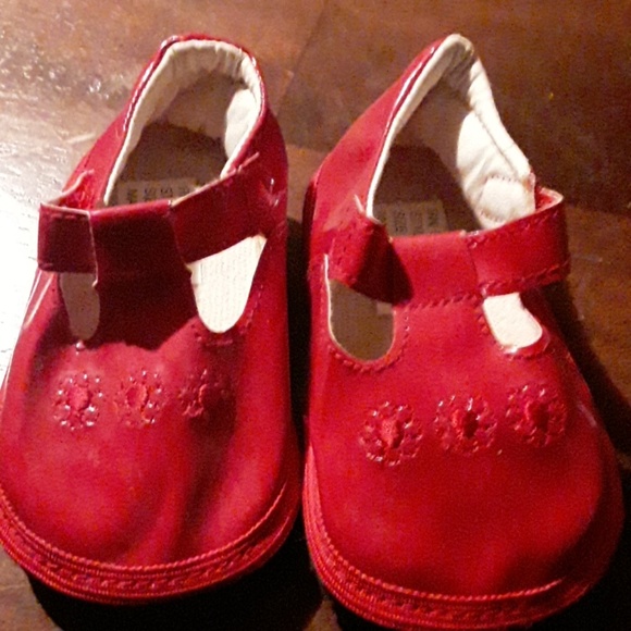 unidentified Other - Red vinyl girls shoes.